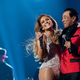Jennifer Lopez (l) and Smokey Robinson perform at the 61st Annual Grammy Awards ceremony.